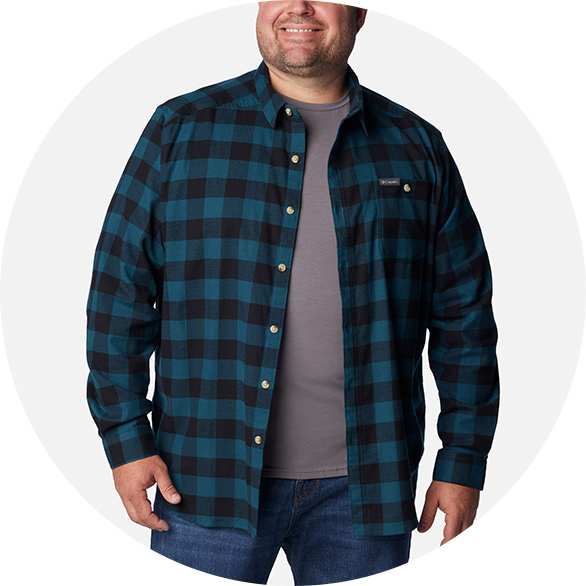 Man in a Cornell Woods flannel shirt. 