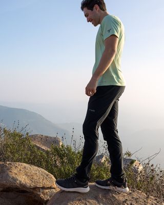 A man hiking in Titanium gear. 