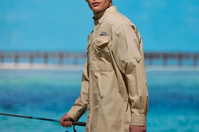 Man fishing in a Bonehead shirt. 