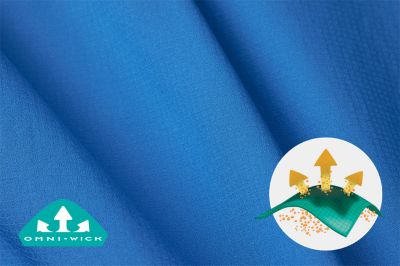 Close up of blue Tamiami fabric with the Omni-Wick logo on the bottom left and a graphic showing how moisture rises to the surface of the fabric to evaporate on the bottom right.