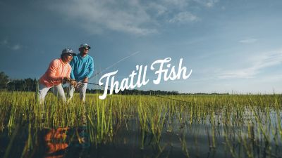 Performance Fishing Gear video showing anglers waiting out a storm in a wetland area followed by an older man showing a child how to tie a line and using the colloquial angler saying, "That'll fish," to say something will work out well.