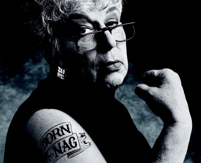 Gert Boyle showing off her "born to nag" tattoo in the infamous Columbia Sportswear advertisement.