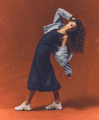 Image of woman with SOREL sneakers on