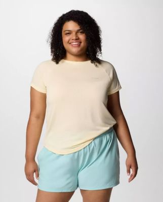 A woman wearing a yellow t-shirt.
