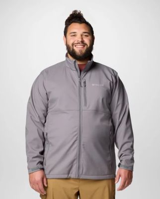 A man wearing a grey jacket.