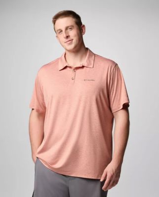 A man wearing an orange polo.