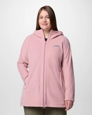 A woman wearing a pink fleece jacket.