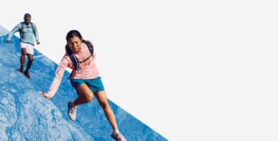 Hikers climbing over a dynamic blue background.