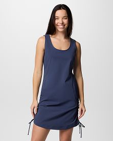 A woman wearing a navy blue dress.
