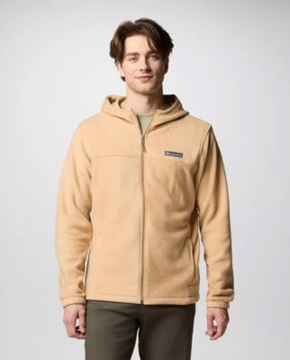 A man wearing a tan fleece jacket.