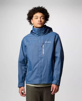 A man wearing a blue rain jacket.