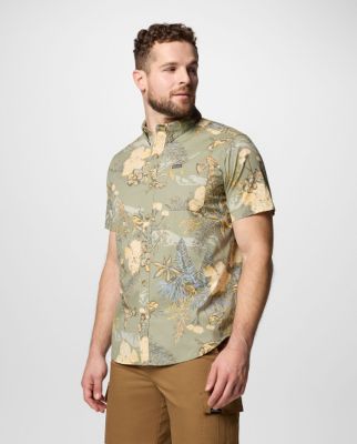 Man wearing a short-sleeve button-up shirt.