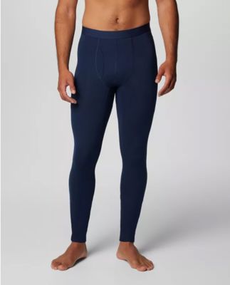 Man wearing navy baselayer tights.