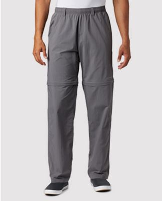 Waist-down image of a man wearing relaxed grey pants.