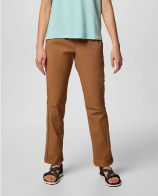 Waist-down image of a woman wearing brown hiking pants.