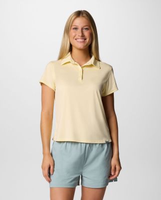Woman wearing a yellow polo.
