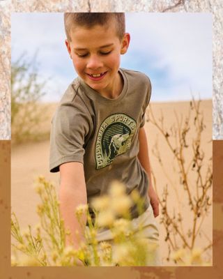 A cute kid on a trail
