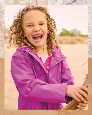 A cute kid on a trail