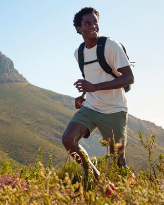 A man hiking in Columbia clothes and equipments