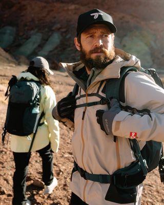A man hiking in Columbia clothes and equipments