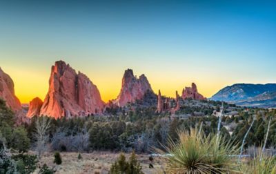 Castellated sandstone towers dominate the desert landscape.