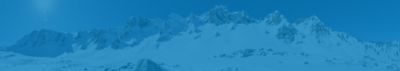 Skiers hiking in snow over a dynamic blue background