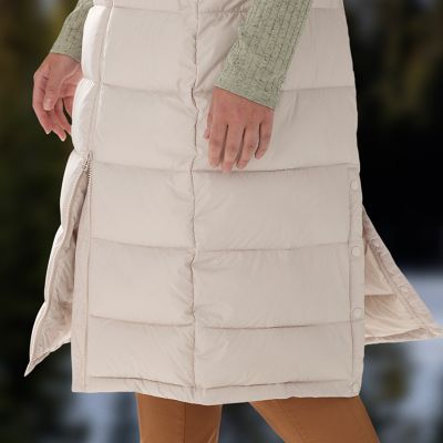 Lower half of the vest showing the two way zipper and side snaps open.