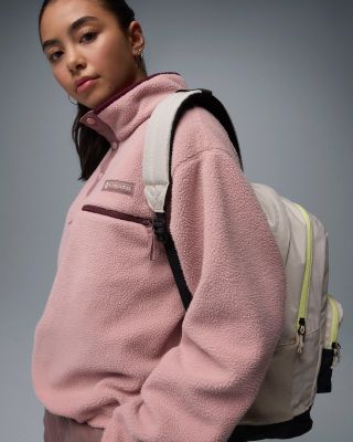 A woman with the backpack.
