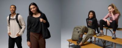 Multiple kids of all ages in back to school gear.