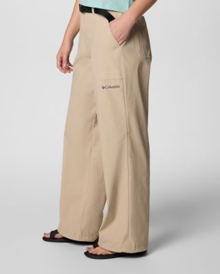 A waist down image of tan loose-fitting pants