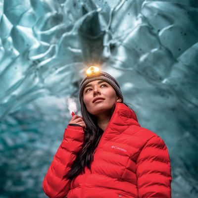 A woman wearing a red down jacket