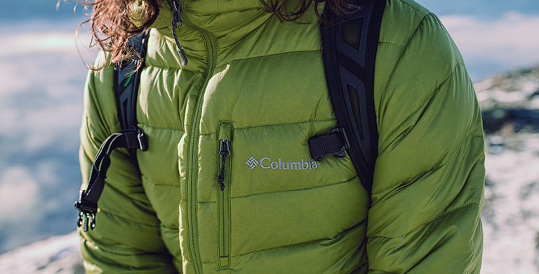 A person wearing a winter jacket made with Responsible Down.