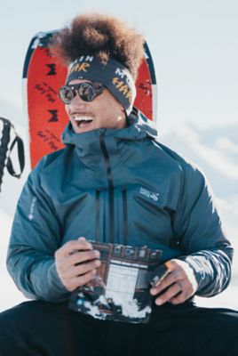 Bryce eating a hot meal in the snow