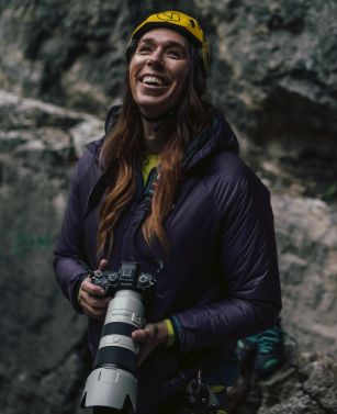 Nikki smiling with her camera