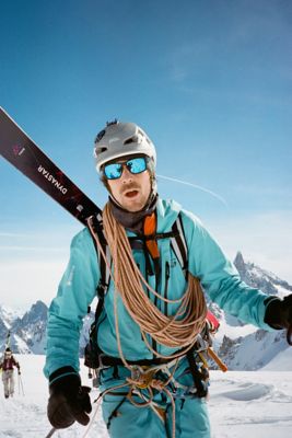 Vivian with mountaineering gear on in the snowy mountains