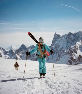 A further away image of Vivian in mountaineering gear