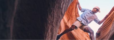 A hiker exploring a canyon with the text: Looking For More?