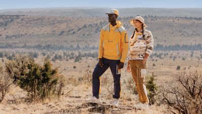 Video of younger, happy hikers exploring Pacific Northwest desert landscapes and beautiful vistas.