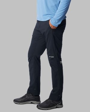 A man wearing dark colored pants.
