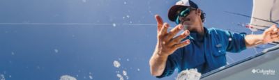 Man reeling in a fish.