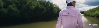 Woman wearing PFG on a boat.