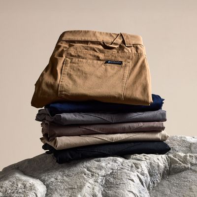 Stack of ROC Pants on a rock.