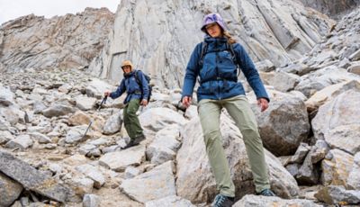 On the approach in Chockstone pants in the high alpine.