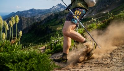 Close up of the Trail Sender shorts while hiking in the mountains.