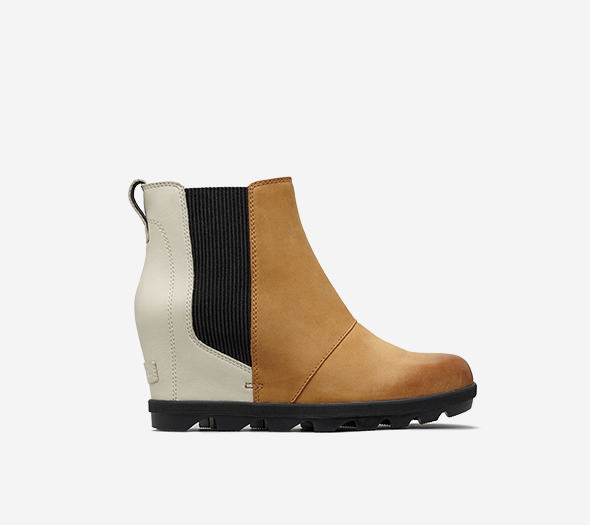 Profile view of a camel brown and white  Joan Wedge Chelsea boot