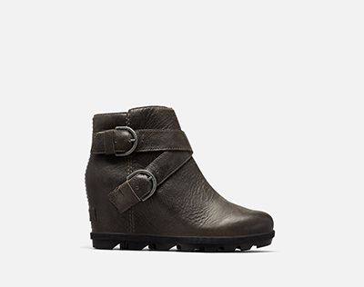  A Joan Wedge Buckle boot on a white background 