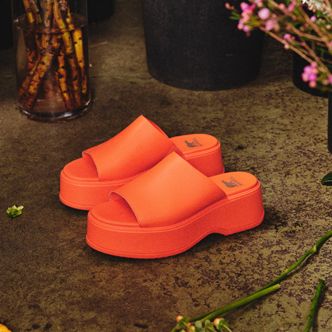 Orange slip on sandals store