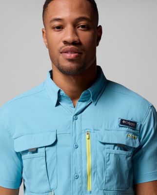 A person wearing a button-up shirt