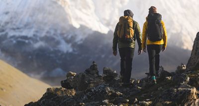 Two trekkers getting close to Everest Base Camp, taking in the view